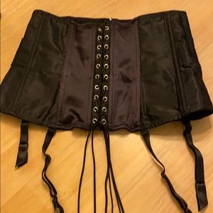 Under the breast corset,  Fredricks of Hollywood